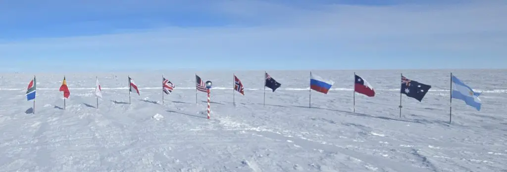 12 flags representing the 12 nations that signed the original Antarctic Treaty at the South Pole - Argentina, Australia, Belgium, Chile, France, Japan, New Zealand, Norway, South Africa, Russia, the United Kingdom and the United States
